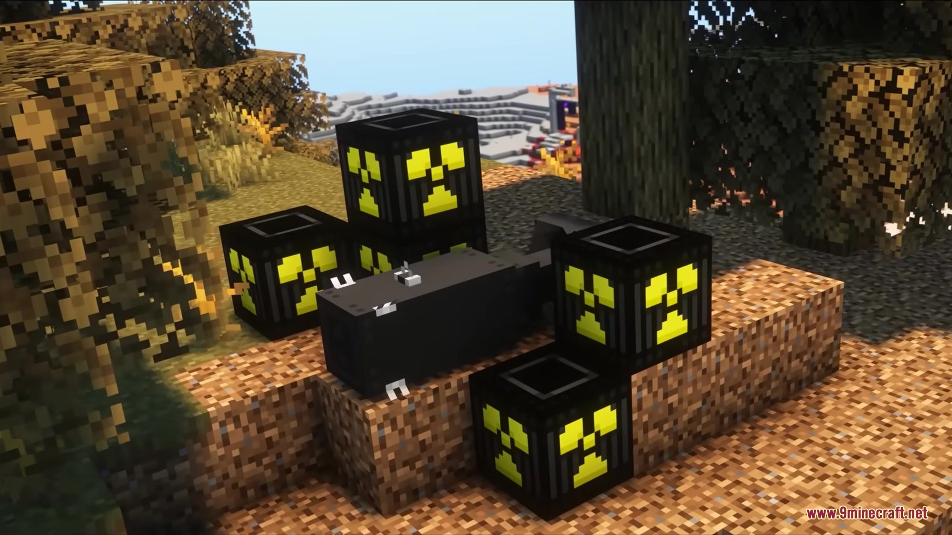 WMD Weapons of Mass Destruction Mod Screenshot 1 Several black nuclear hazard blocks and a bomb placed on the forest floor