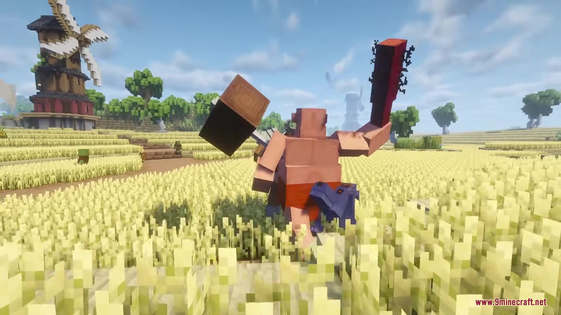 Wandering Orc Mod Screenshot 14 A large ogre raises its arms near a windmill in a wheat field