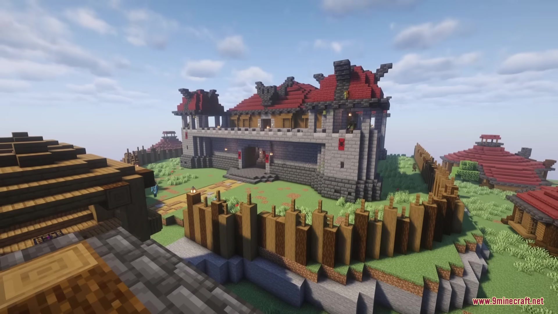 Wandering Orc Mod Screenshot 18 A massive stone fortress with red roofs and a wooden palisade wall