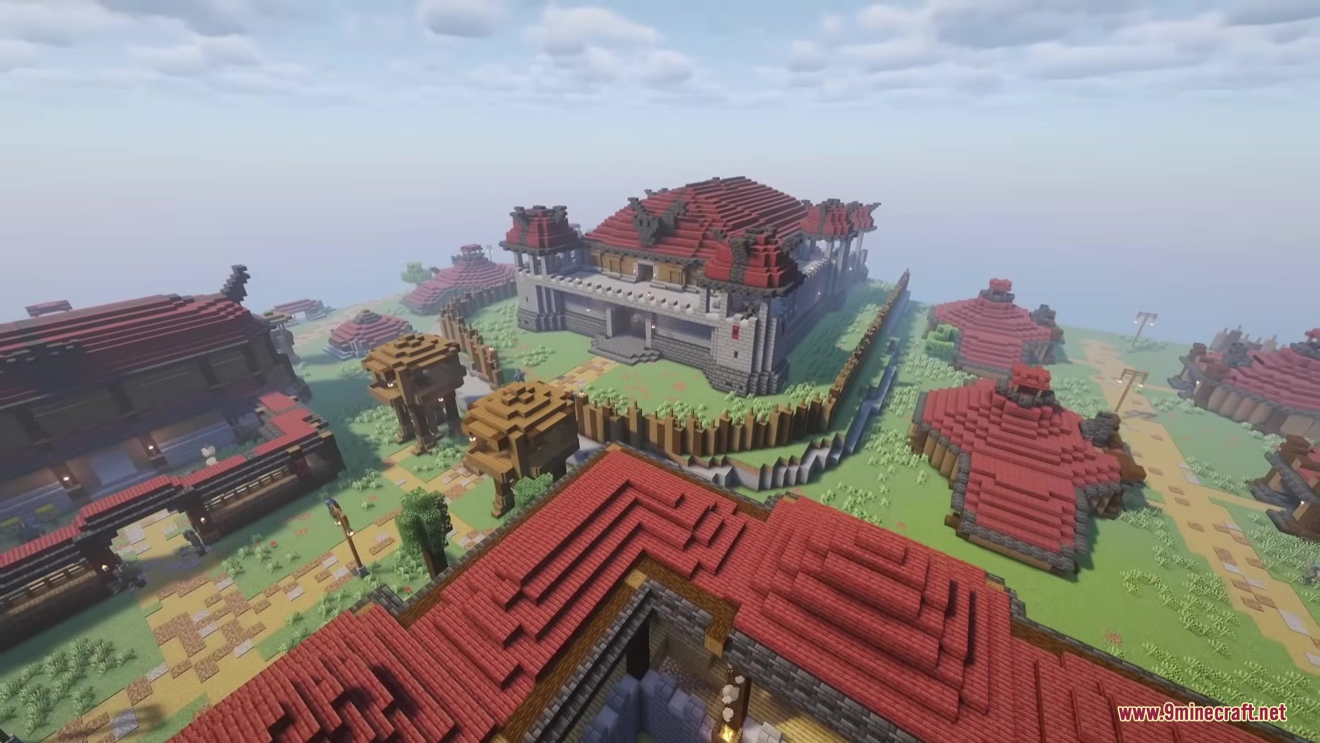 Wandering Orc Mod Screenshot 19 A large stone fortress with red roofs and a wooden defensive wall