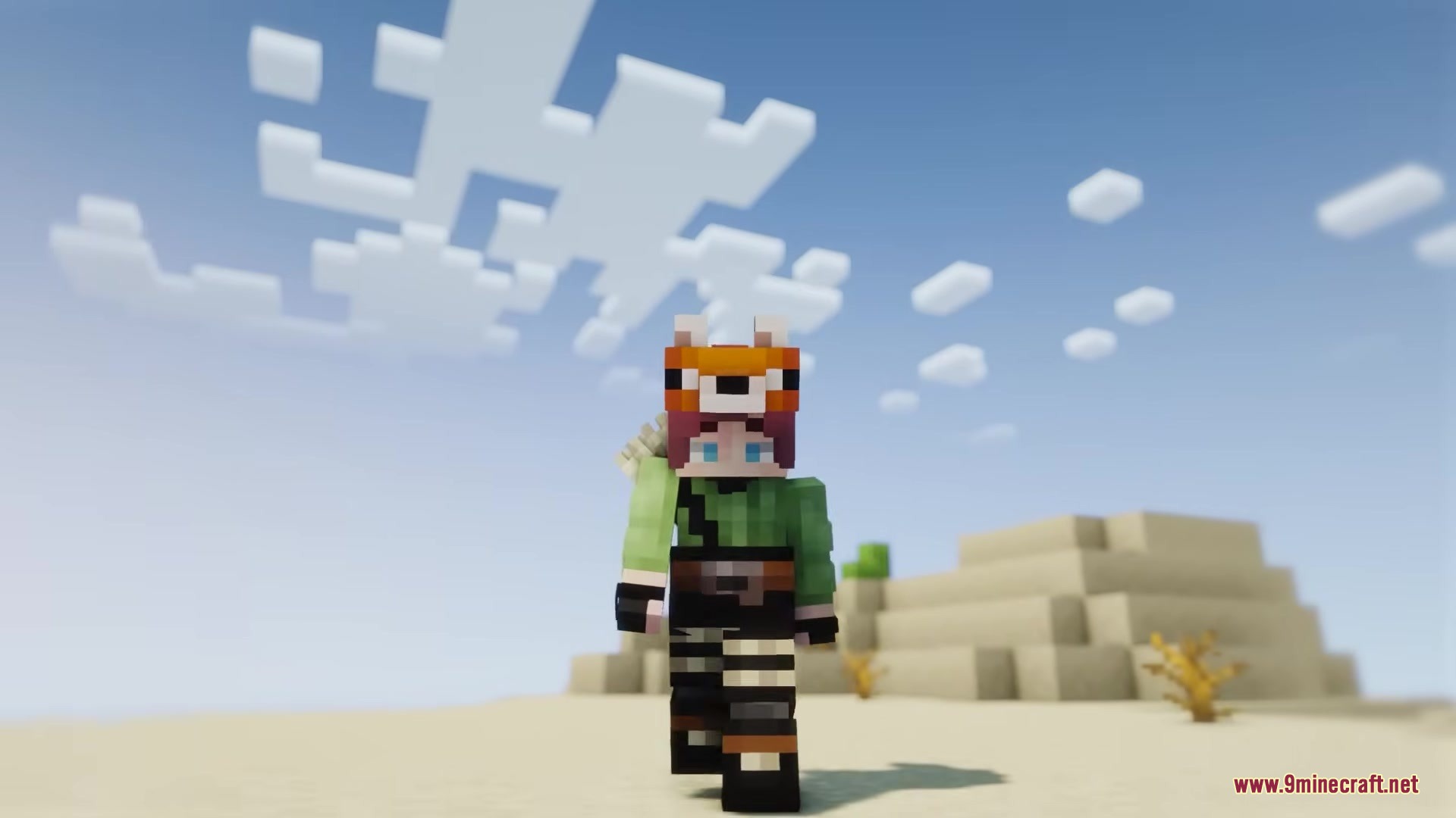 Wandrous Mod Screenshot 1 A Minecraft player wearing a fox mask stands in a desert