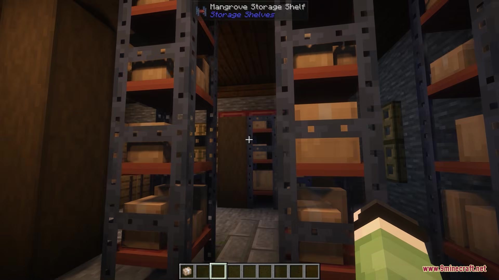 A dark storage room featuring several tall shelves filled with cardboard boxes