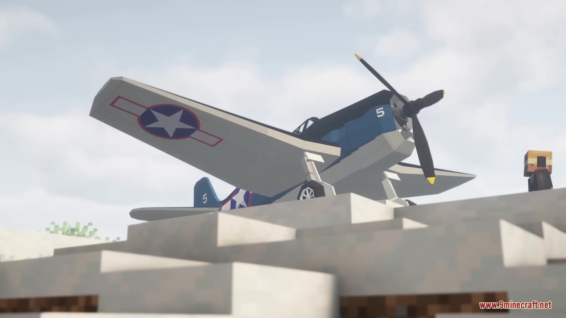 Warfare Wings Mod Screenshot 6 A blue fighter plane with American markings parked on a blocky Minecraft hill