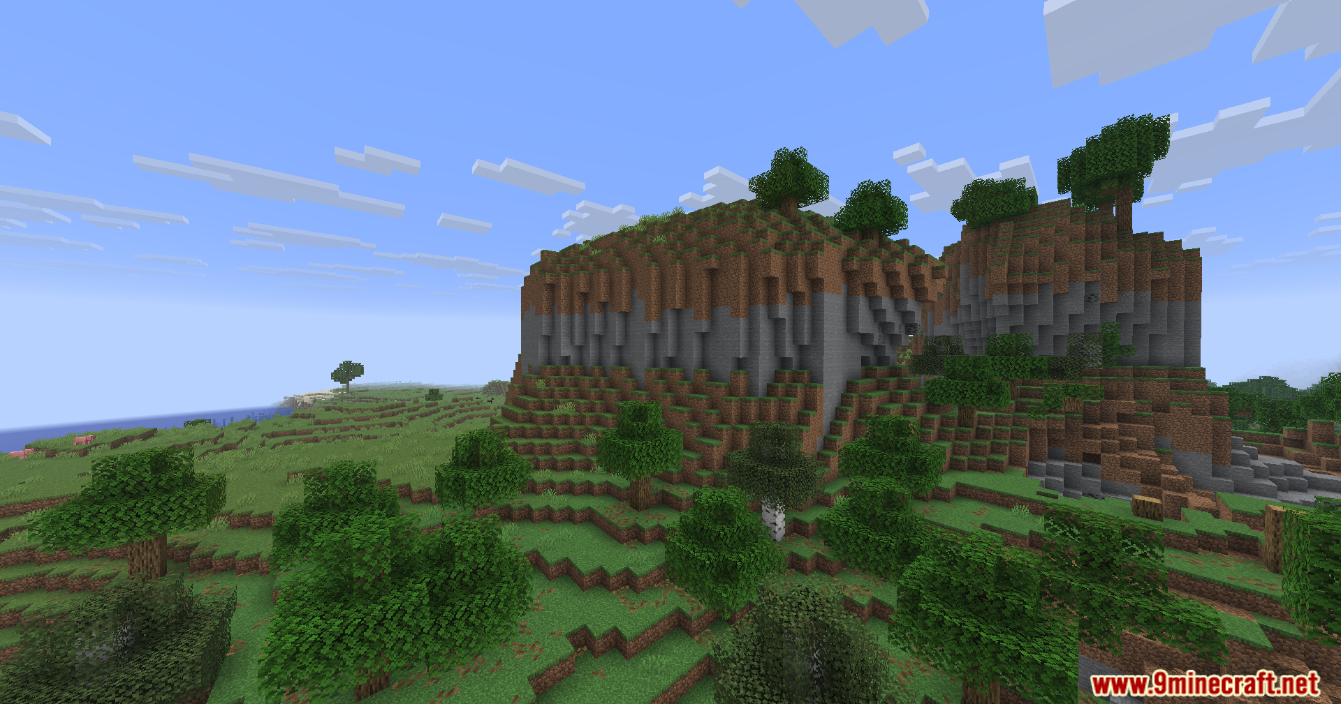 WayGL Mod Screenshot 3 A large dirt and stone plateau stands in a vast grassy landscape