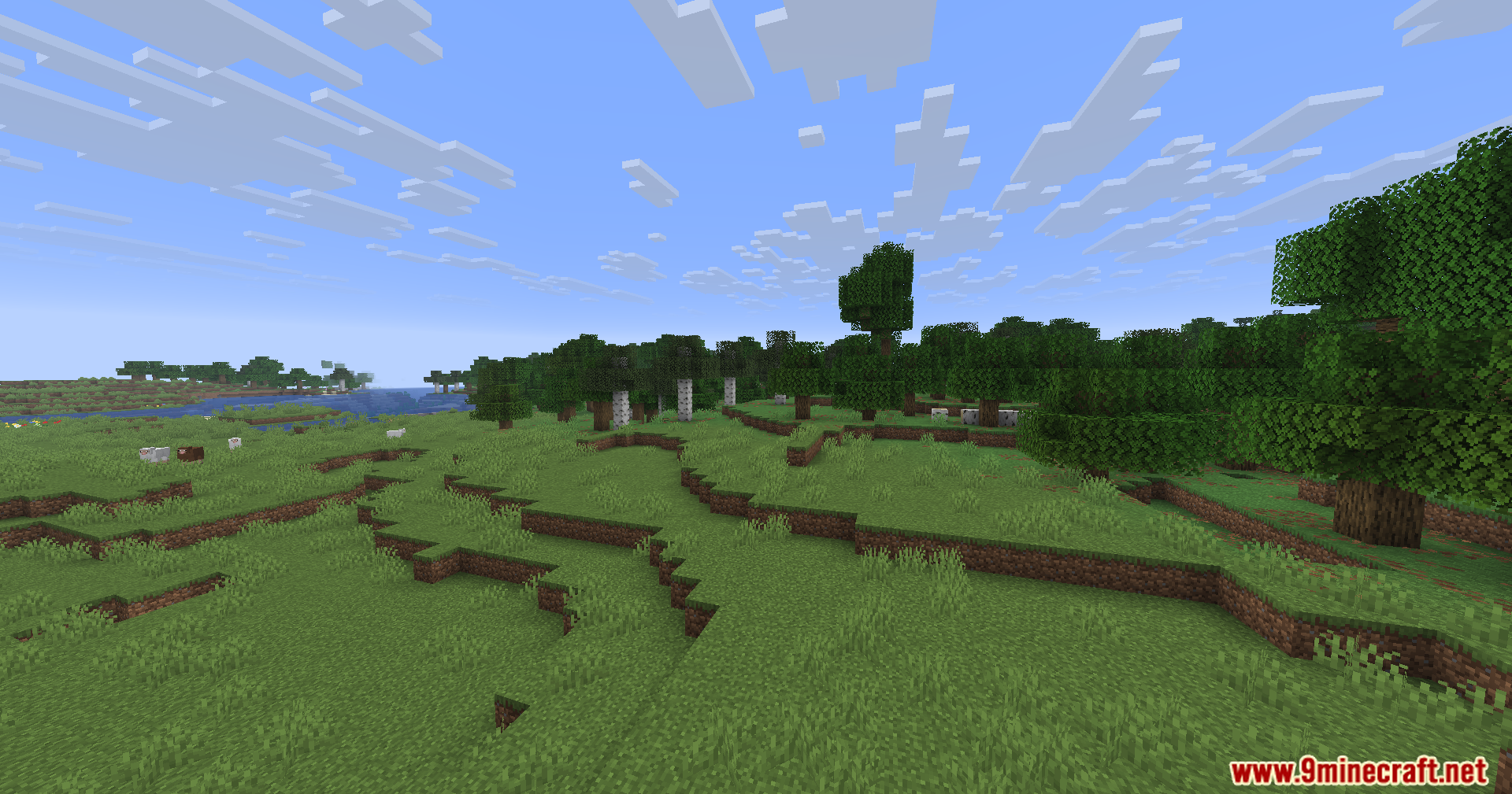 WayGL Mod Screenshot 8 Sheep wandering through a green field near a forest and a river