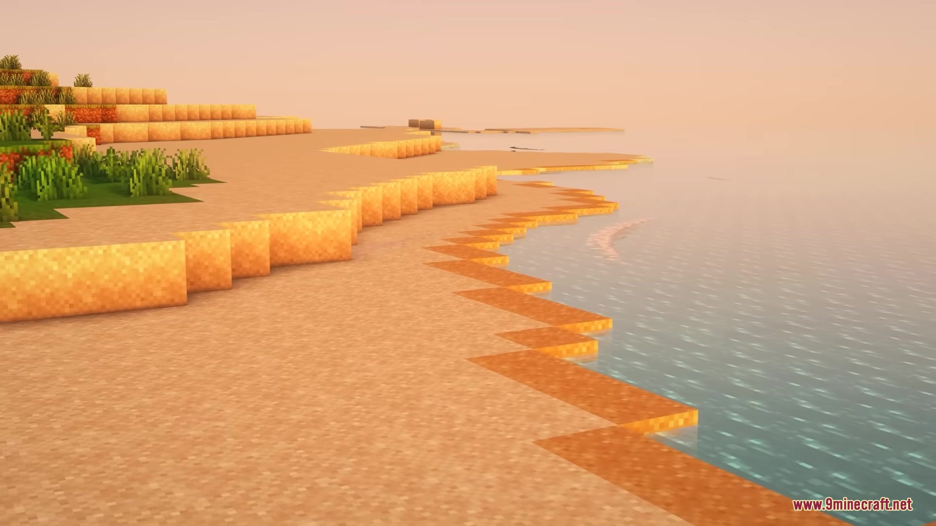 Wet Sand Mod Screenshot 3 Scenic sunset view of a Minecraft beach with damp sand blocks near water