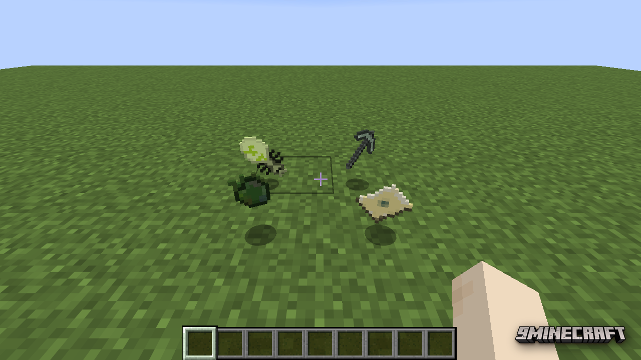 Adventuring gear on the ground including a magic map, pickaxe, and glowing moonworm