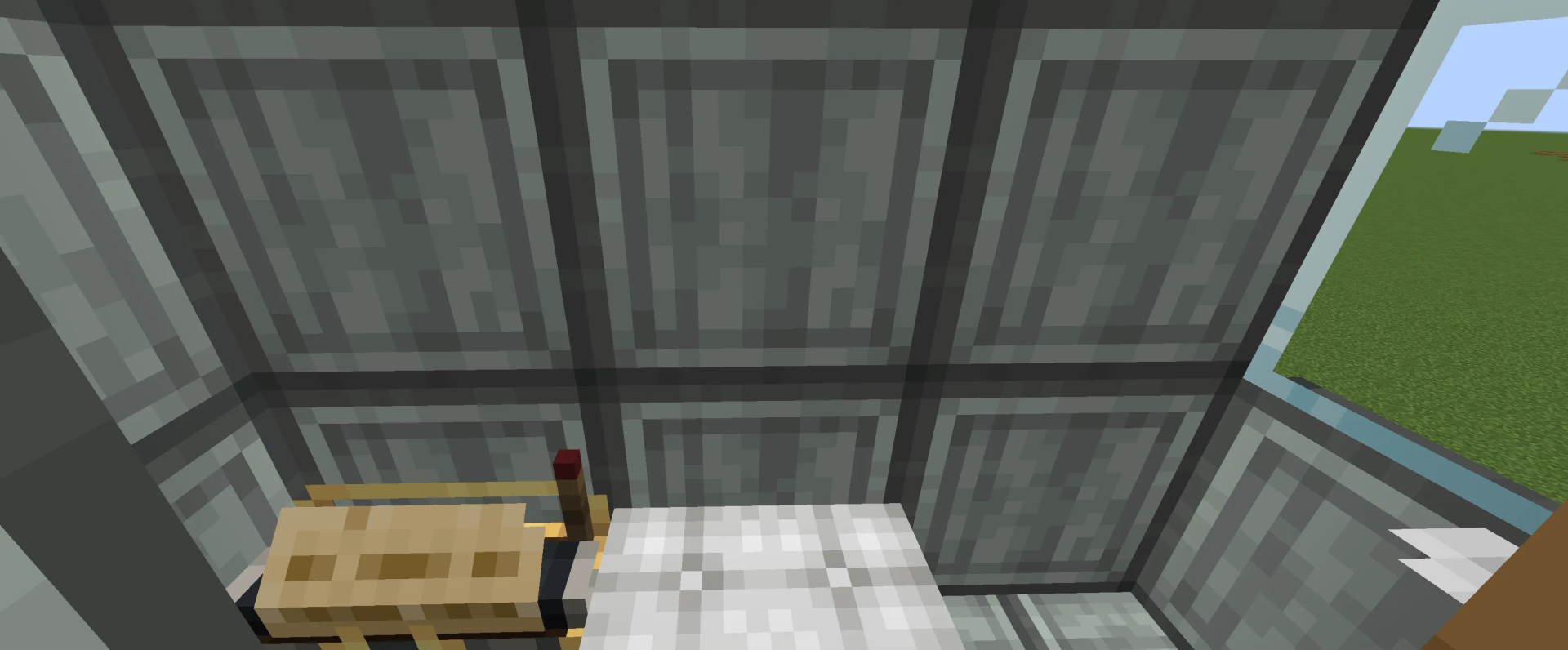 Interior view of a Minecraft tank showing a bed and white flooring