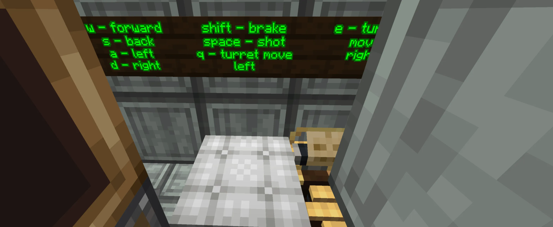 Control signs for driving and shooting inside a custom Minecraft tank interior