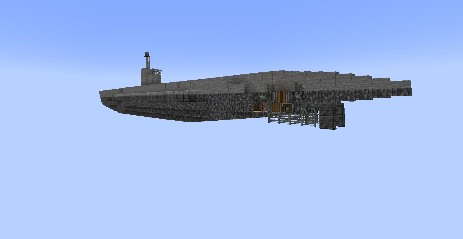 Side view of a grey Minecraft submarine floating in a blue sky