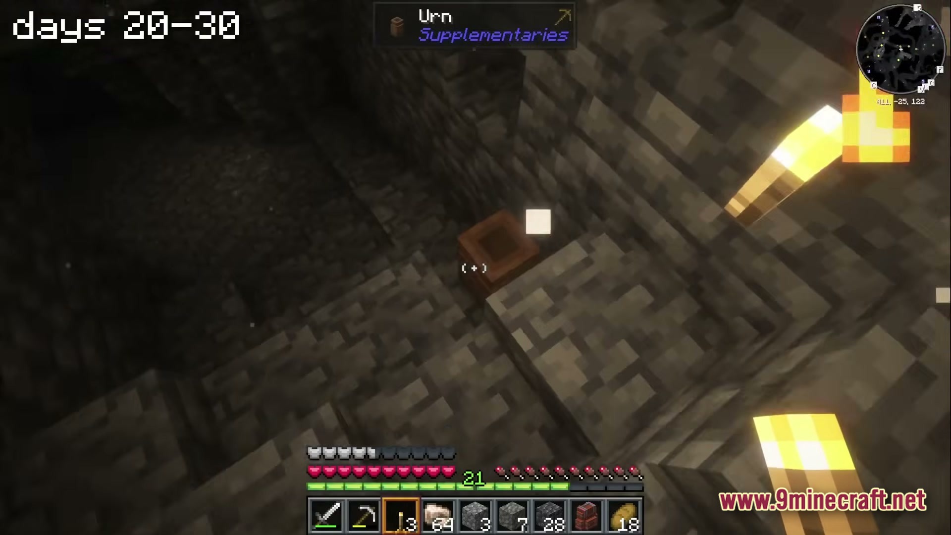 A Cozy Mizuno World Modpack Screenshot 5 A player explores a dark stone cave containing a decorative urn from the Supplementaries mod
