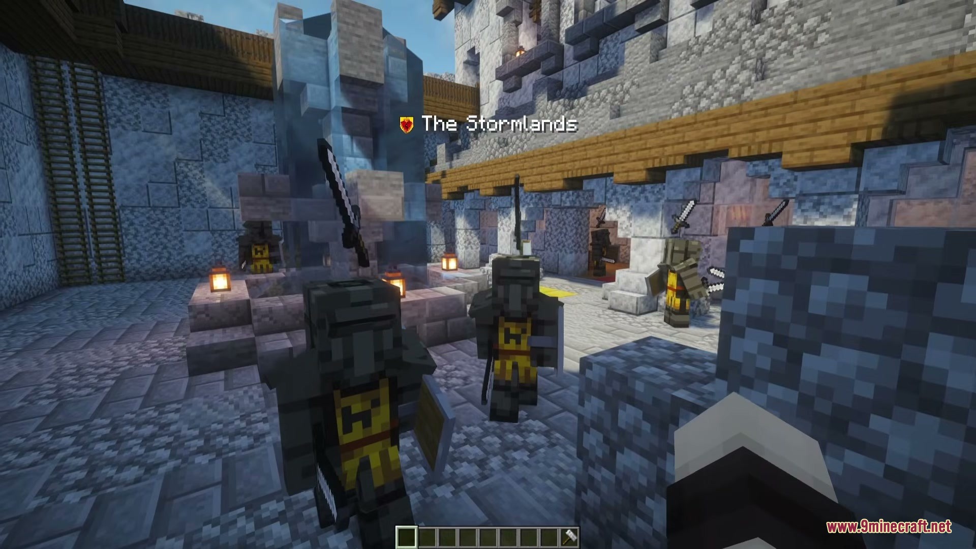 A Game of Blocks Mod Screenshot 8 Two knights in yellow and black armor guard the Stormlands castle courtyard