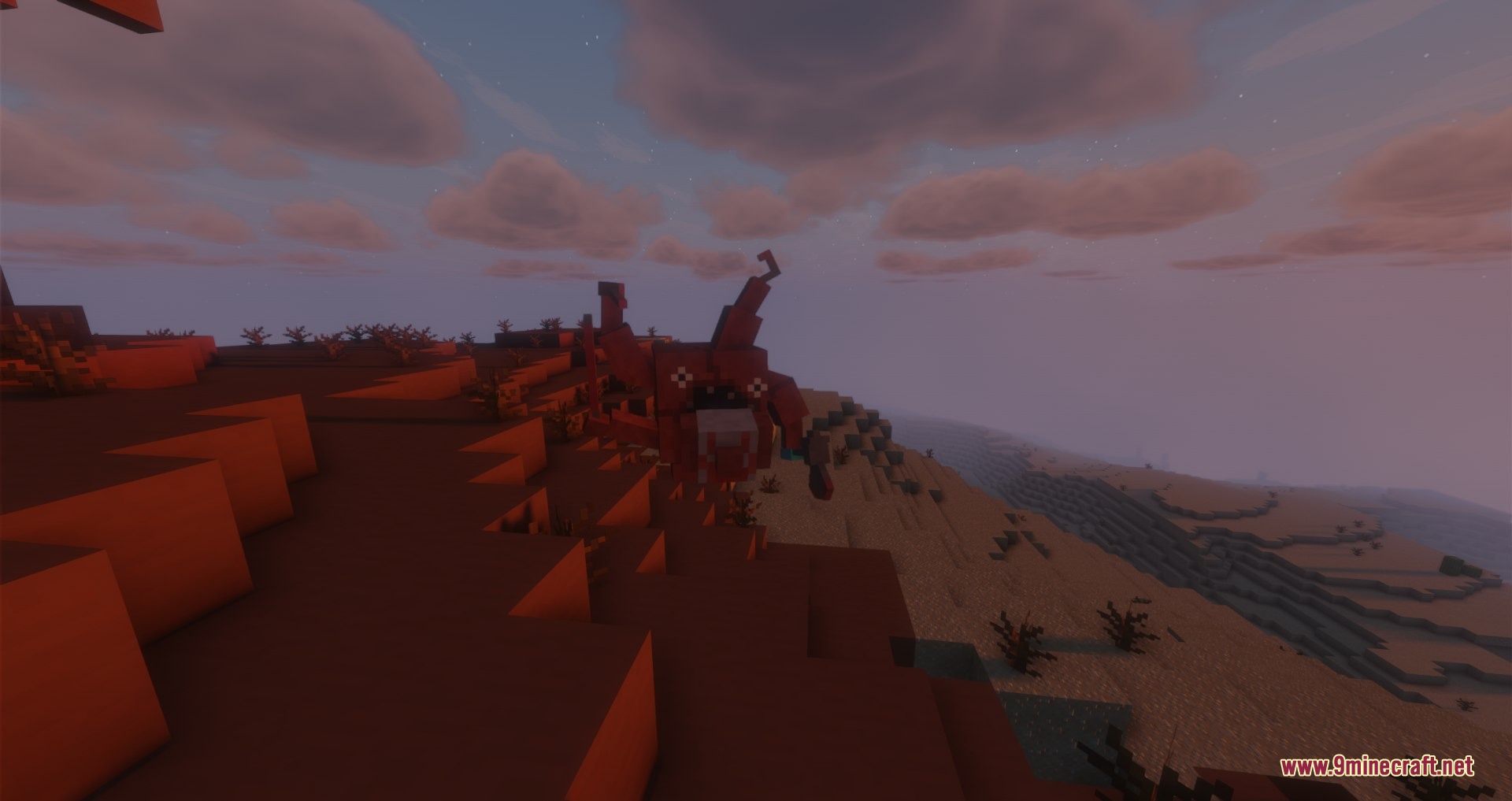 A red abnormality creature stands on a mesa cliff overlooking a vast desert
