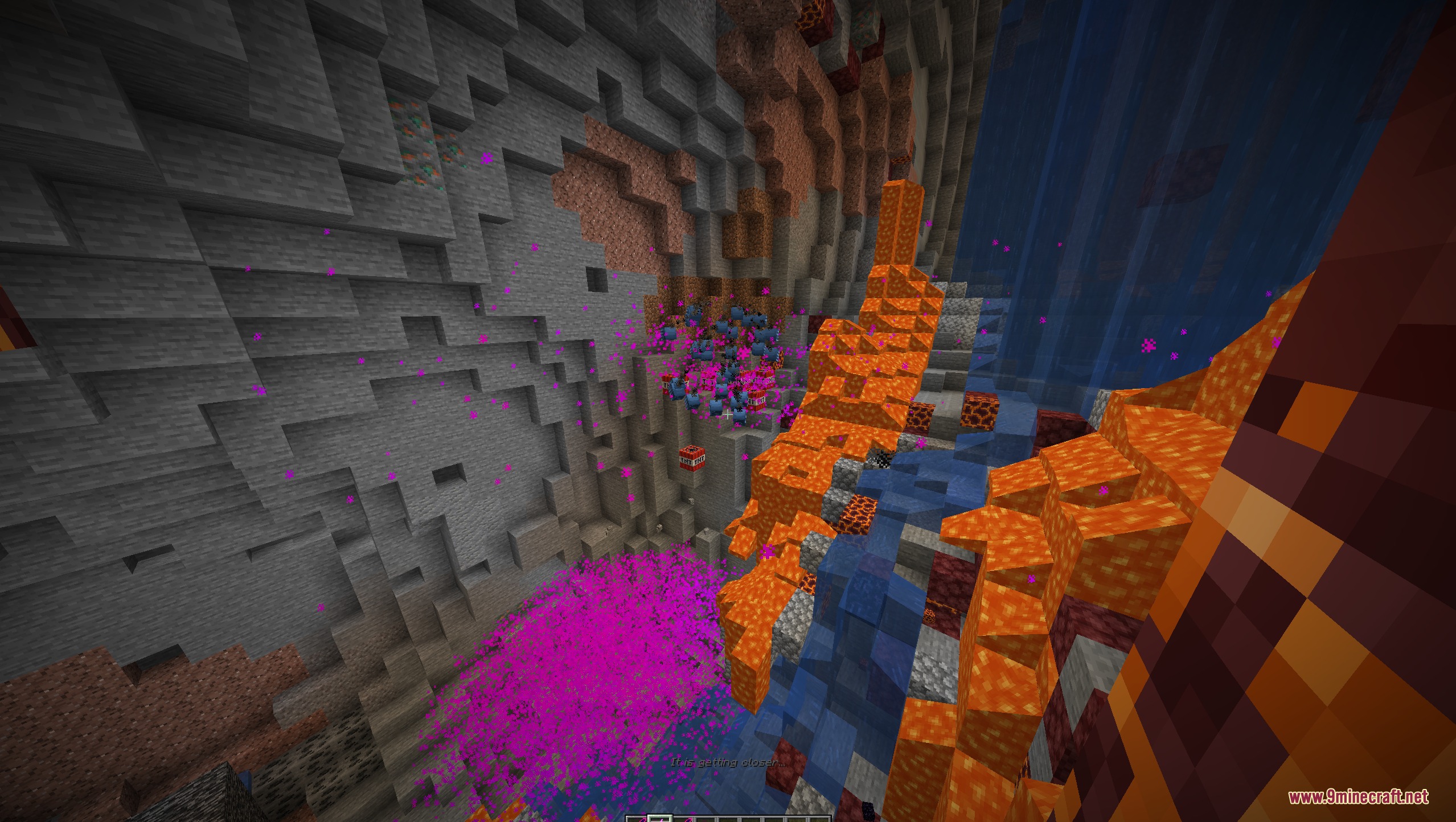 Admin Swords Mod Screenshot 4 A large crater in a cave with lava and purple particle effects