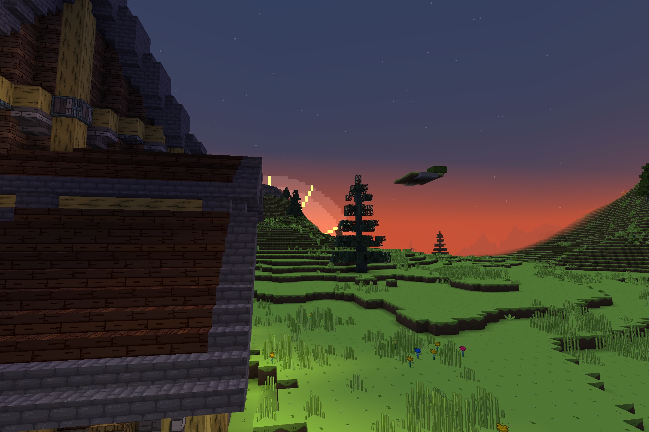 Stylized sun sets behind green hills under a starry purple and orange sky
