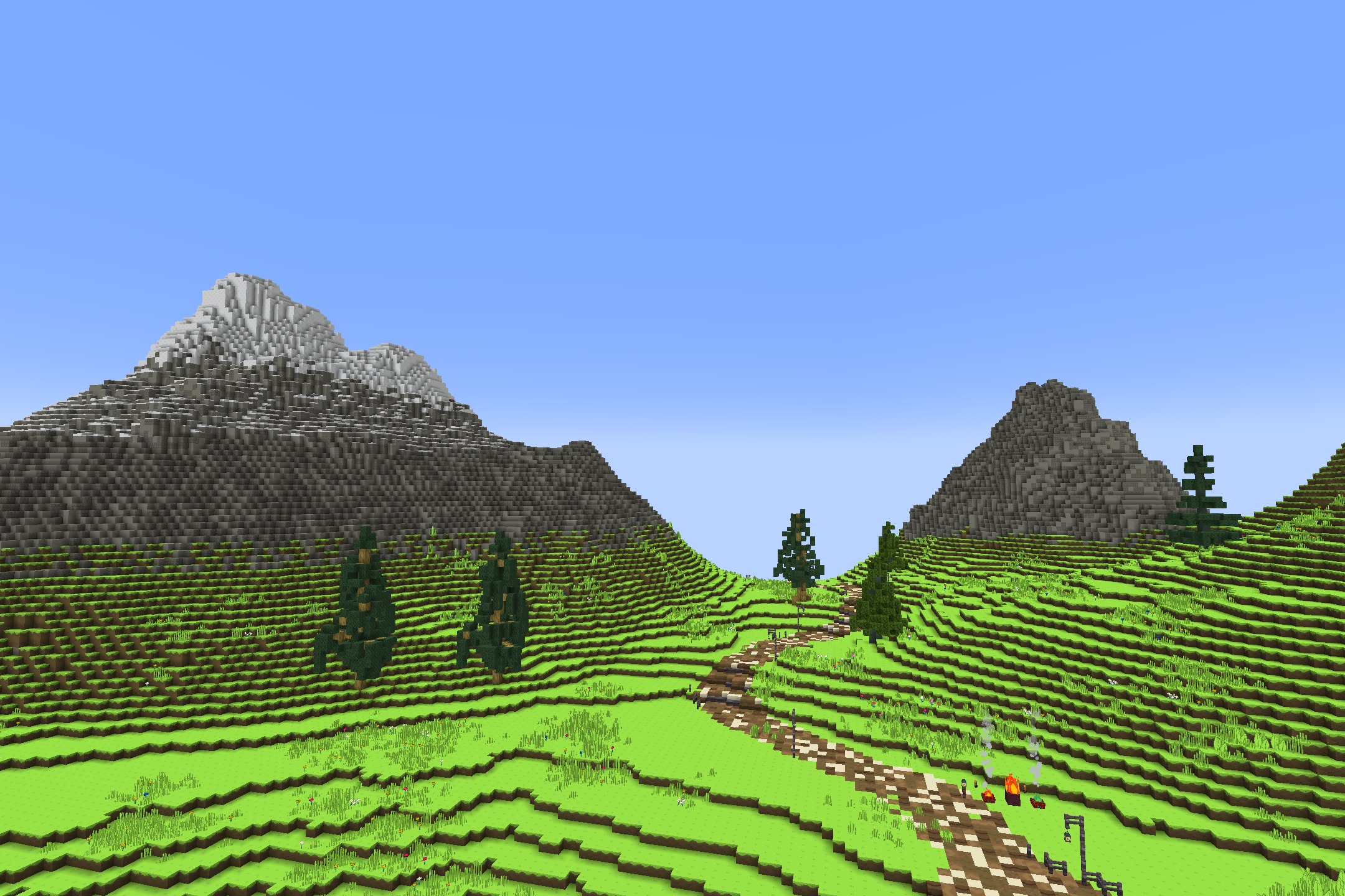 Adventure Time Craft resource pack features vibrant hills and tall snowy mountains