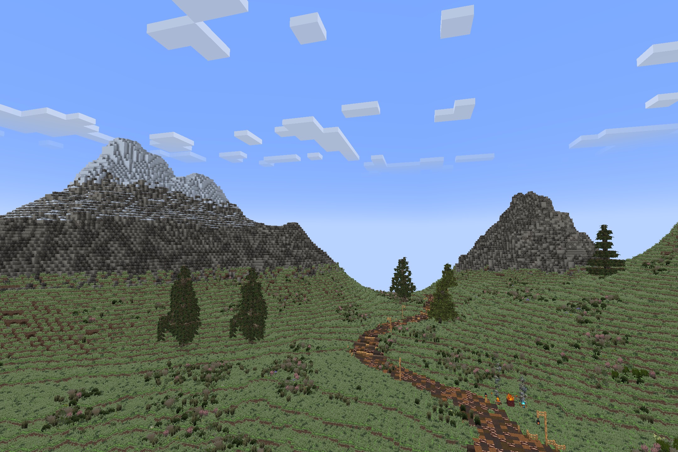 Aeternum Realism Resource Pack Screenshot 3 Scenic landscape featuring rolling green hills and distant mountains with realistic textures