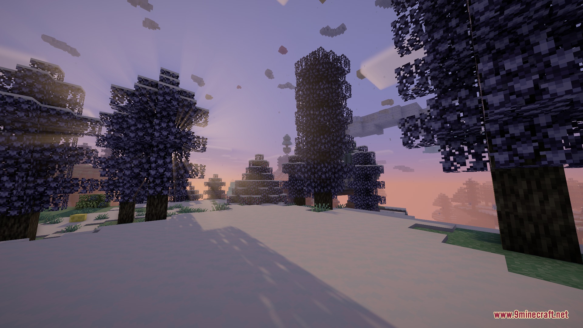 Aether Regenerated Resource Pack Screenshot 5 Purple trees stand on a snowy field under a soft purple sunset sky