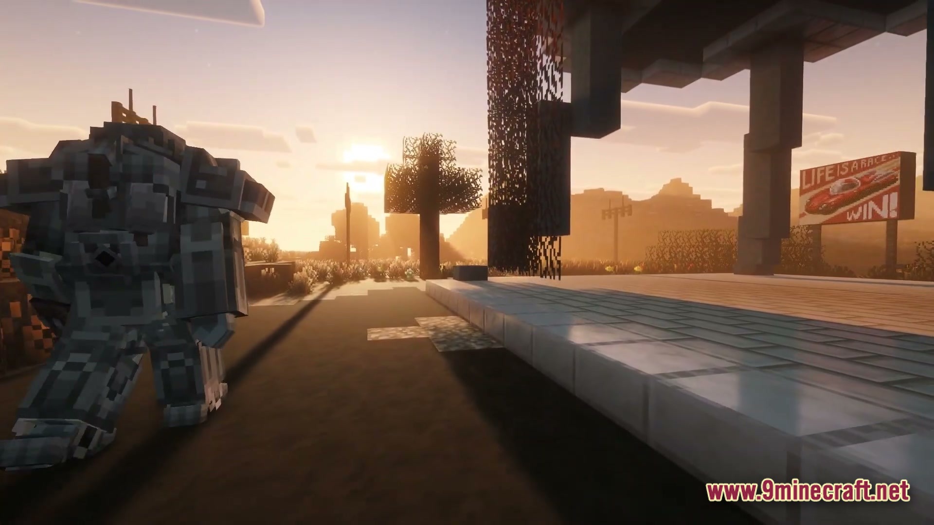 After The Nukes Modpack Screenshot 1 A player wearing power armor stands near a ruined gas station in a post-apocalyptic wasteland