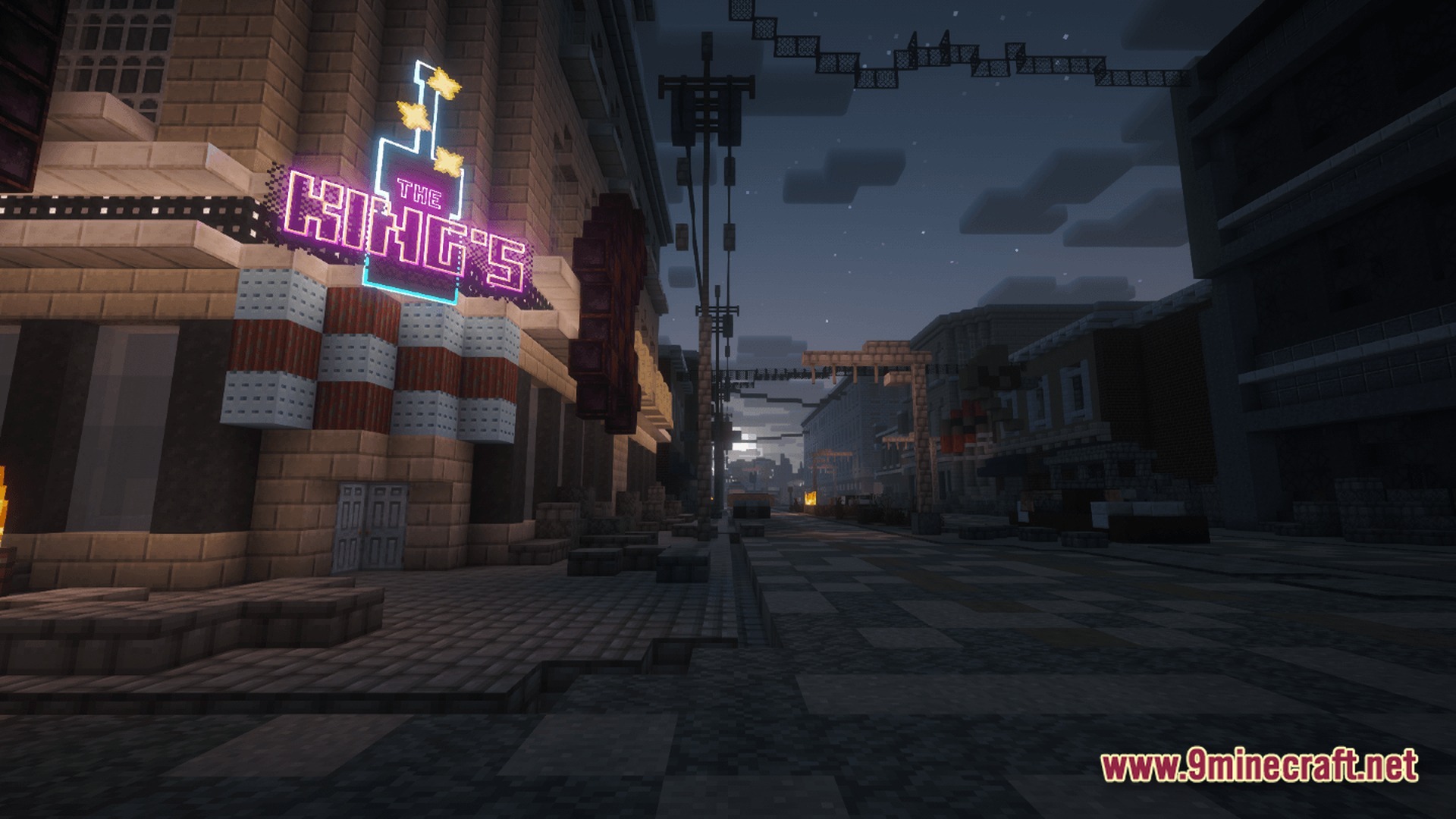 After The Nukes Modpack Screenshot 8 A neon sign for The King's hangs over a dark, abandoned city street at night