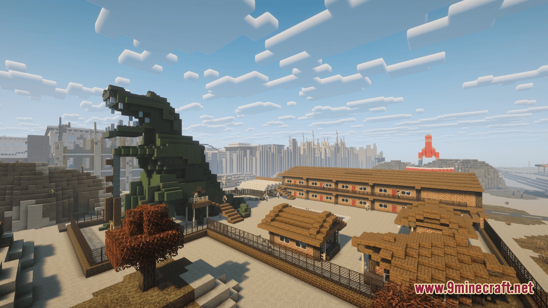 After The Nukes Modpack Screenshot 9 A dinosaur statue stands beside a motel in a post-apocalyptic wasteland with ruined city buildings