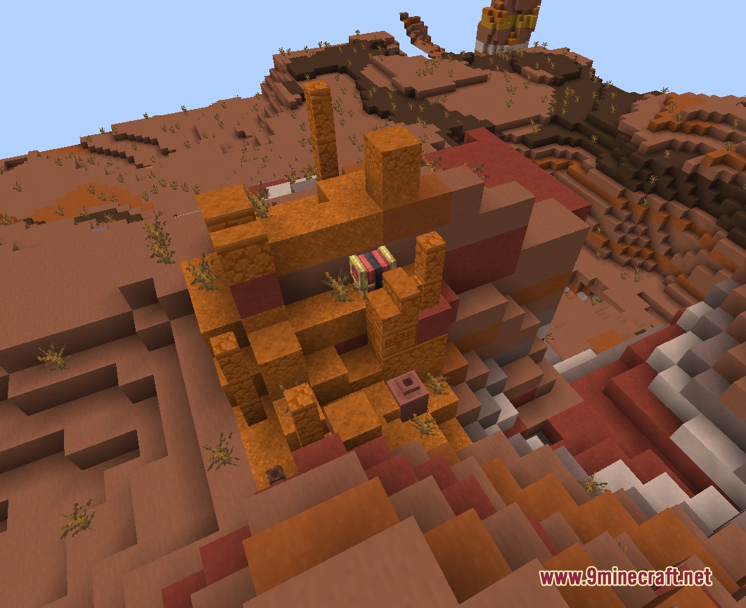 Aio's Extra Structures Mod Screenshot 3 Ruined building with a chest in the badlands biome for players to explore