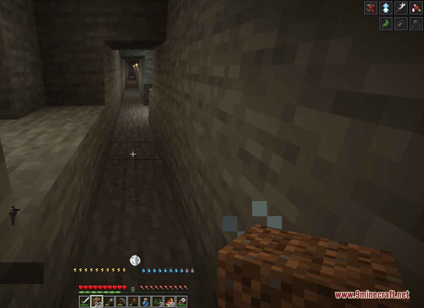 Alive Life & Death Mod Screenshot 3 Player holding a dirt block while exploring a narrow stone mine tunnel