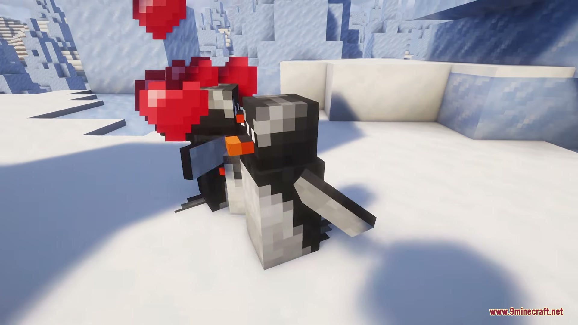 Two penguins breeding with red heart particles floating above their heads