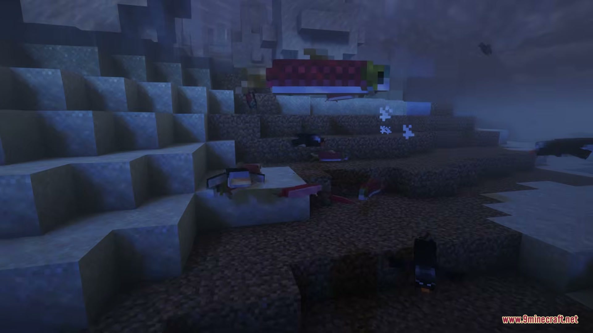 Penguins swimming underwater near a large salmon in a cold ocean biome