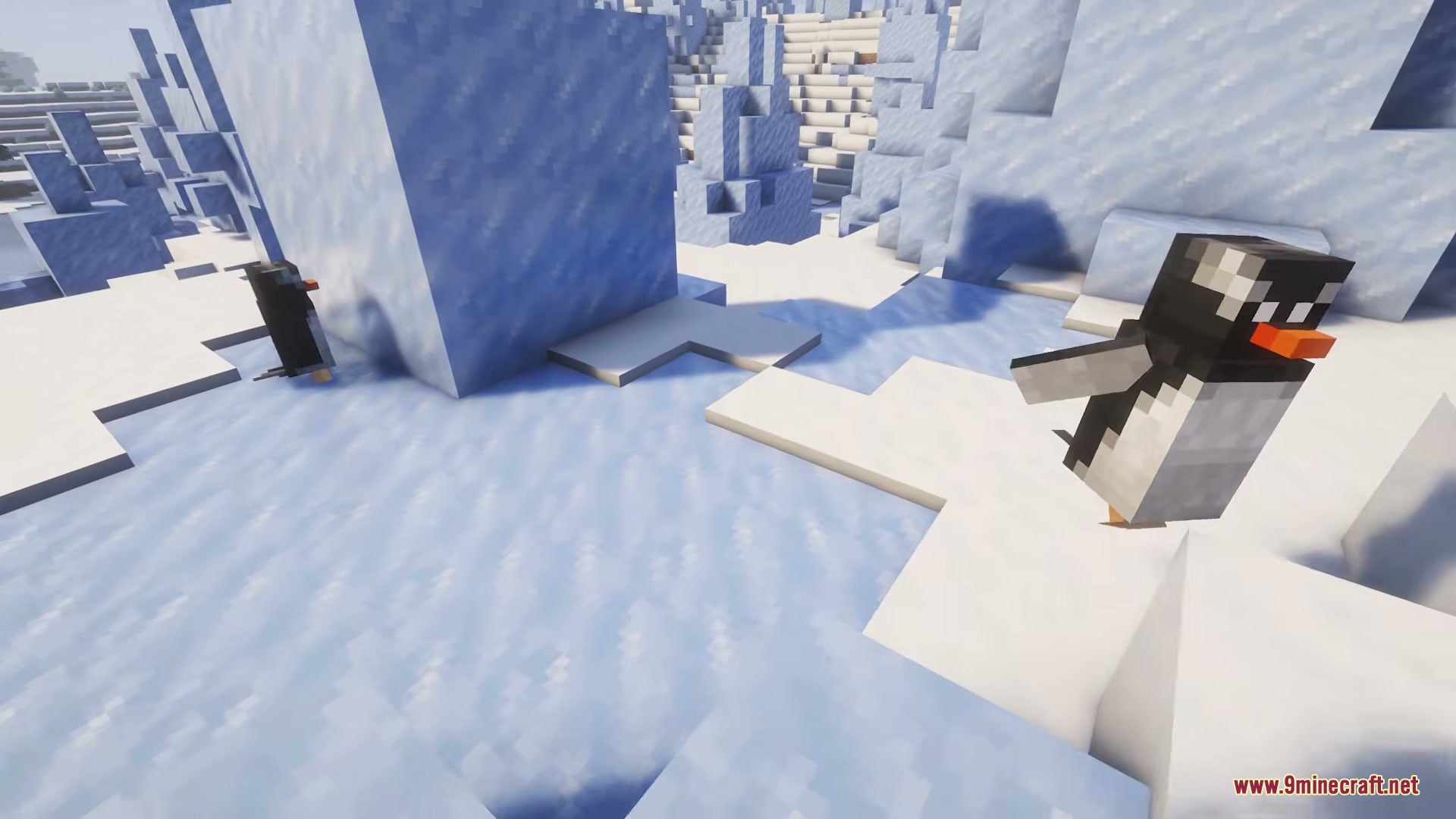 Two penguins wandering across ice and snow in a cold Minecraft biome