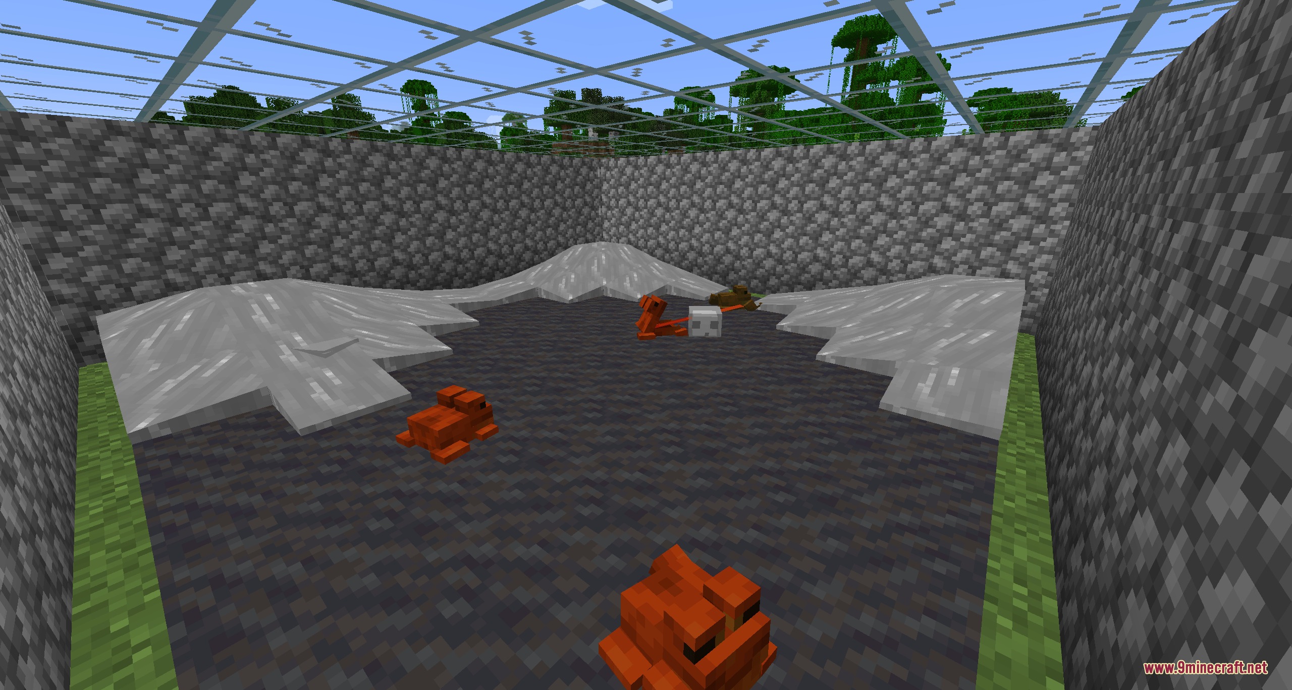 Amphibian Alchemy Mod Screenshot 1 Several orange frogs inside a large cobblestone enclosure with a glass roof