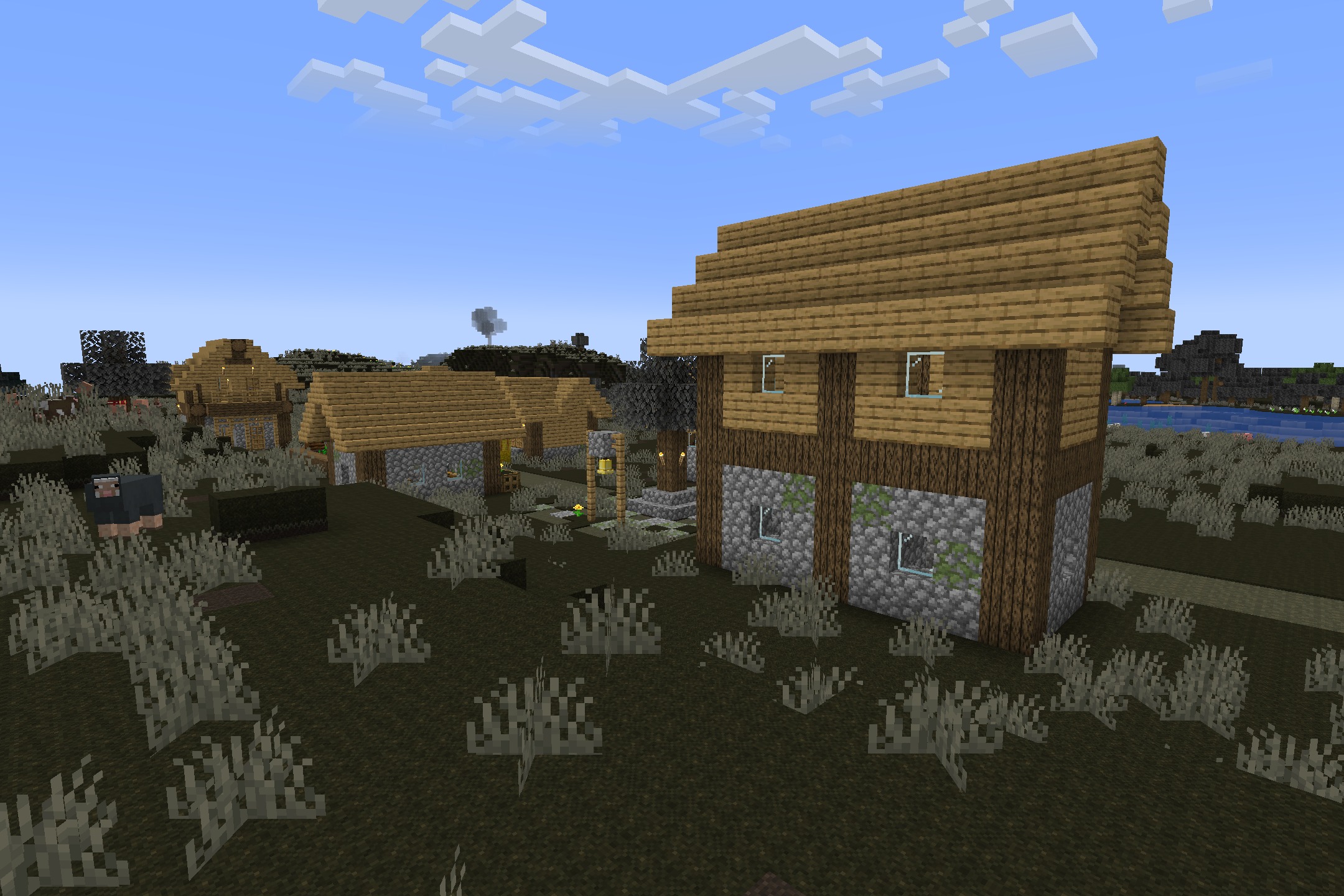 AmstellHD ZOMBIE Apocalypse Resource Pack Screenshot 3 A dark and ruined Minecraft village with dead grass and weathered buildings