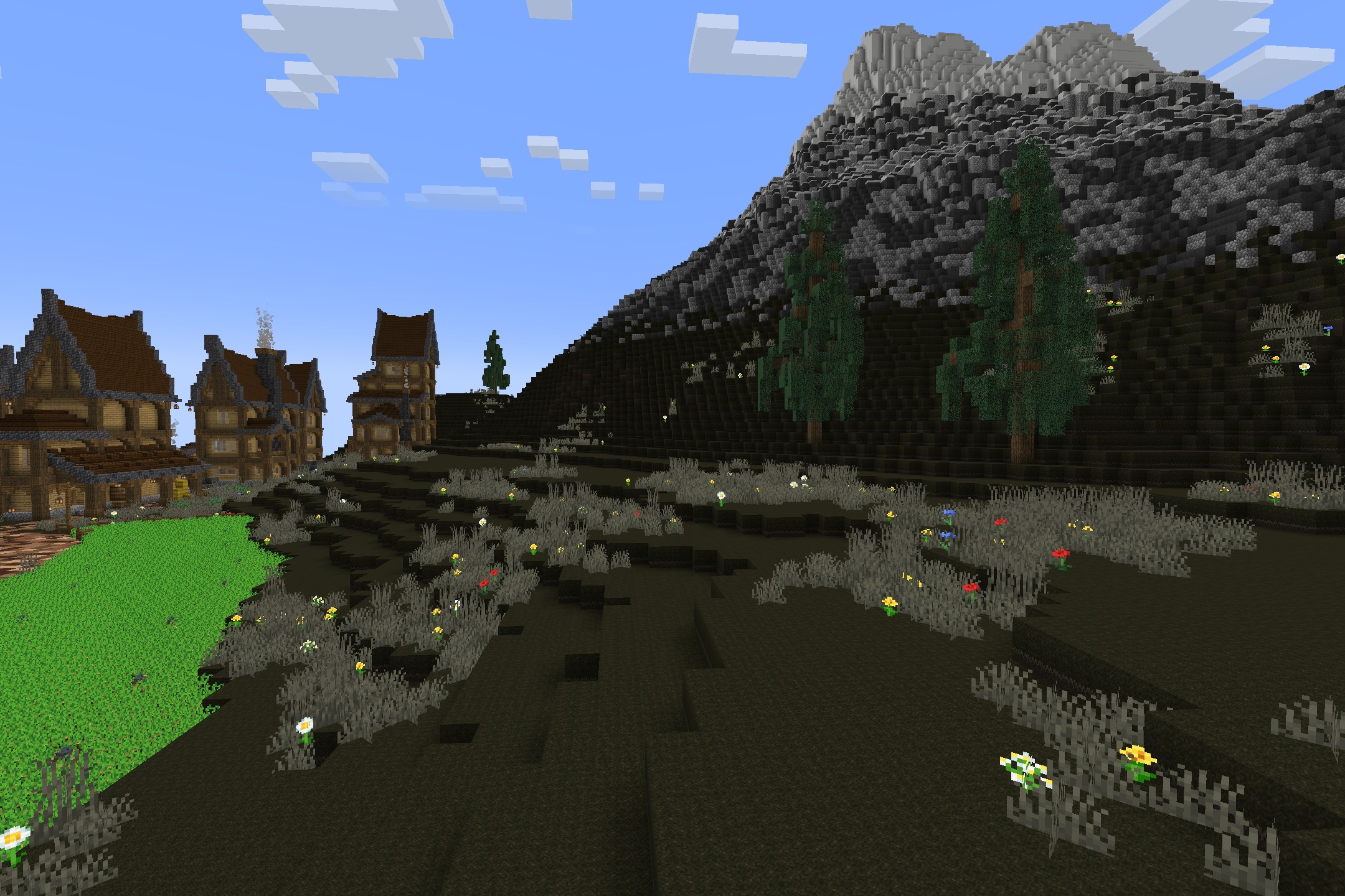 AmstellHD ZOMBIE Apocalypse Resource Pack Screenshot 4 A dark mountain landscape with dead grass and buildings in a wasteland