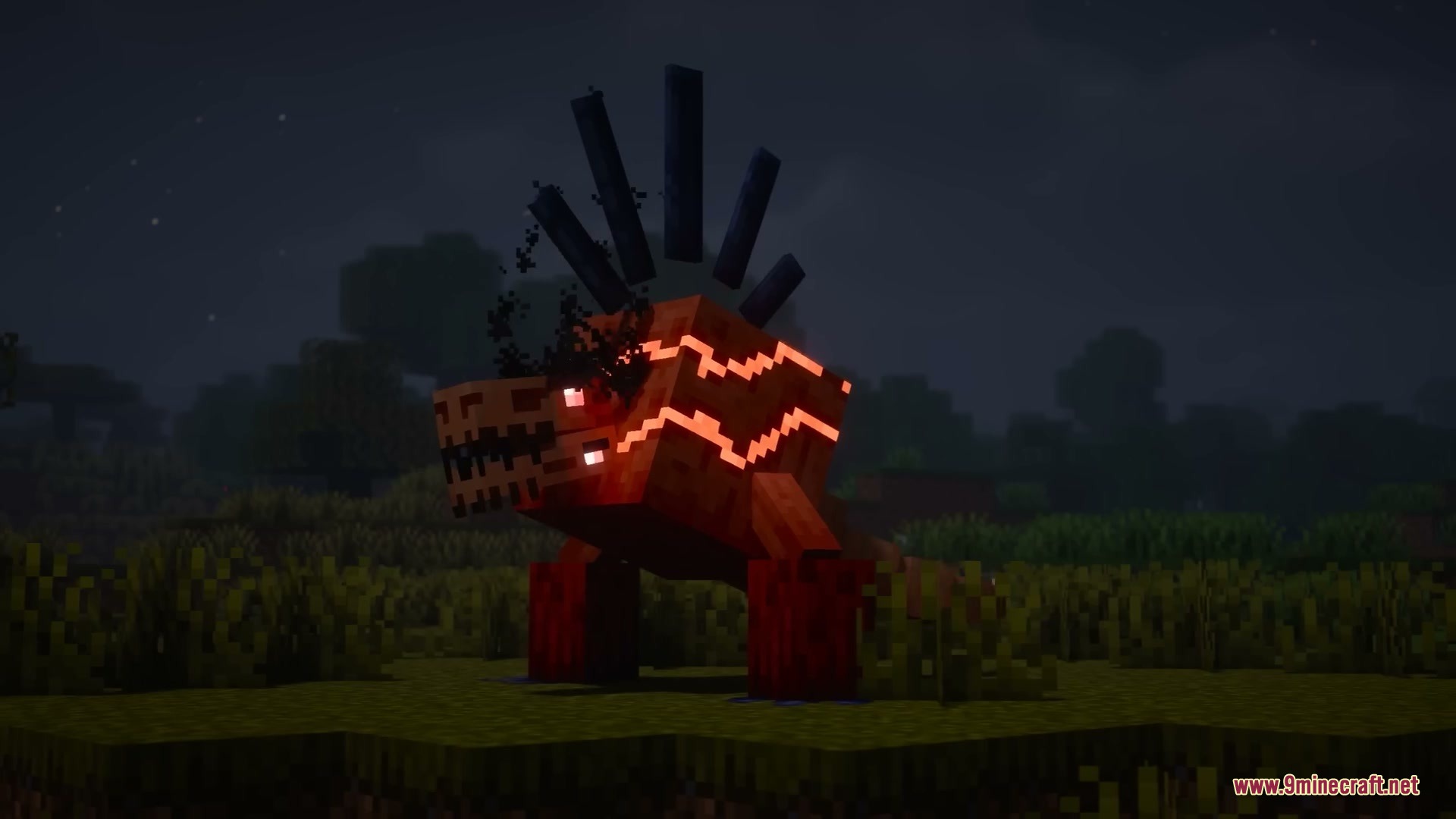 A hostile red abomination with glowing patterns stands in a dark grassy field