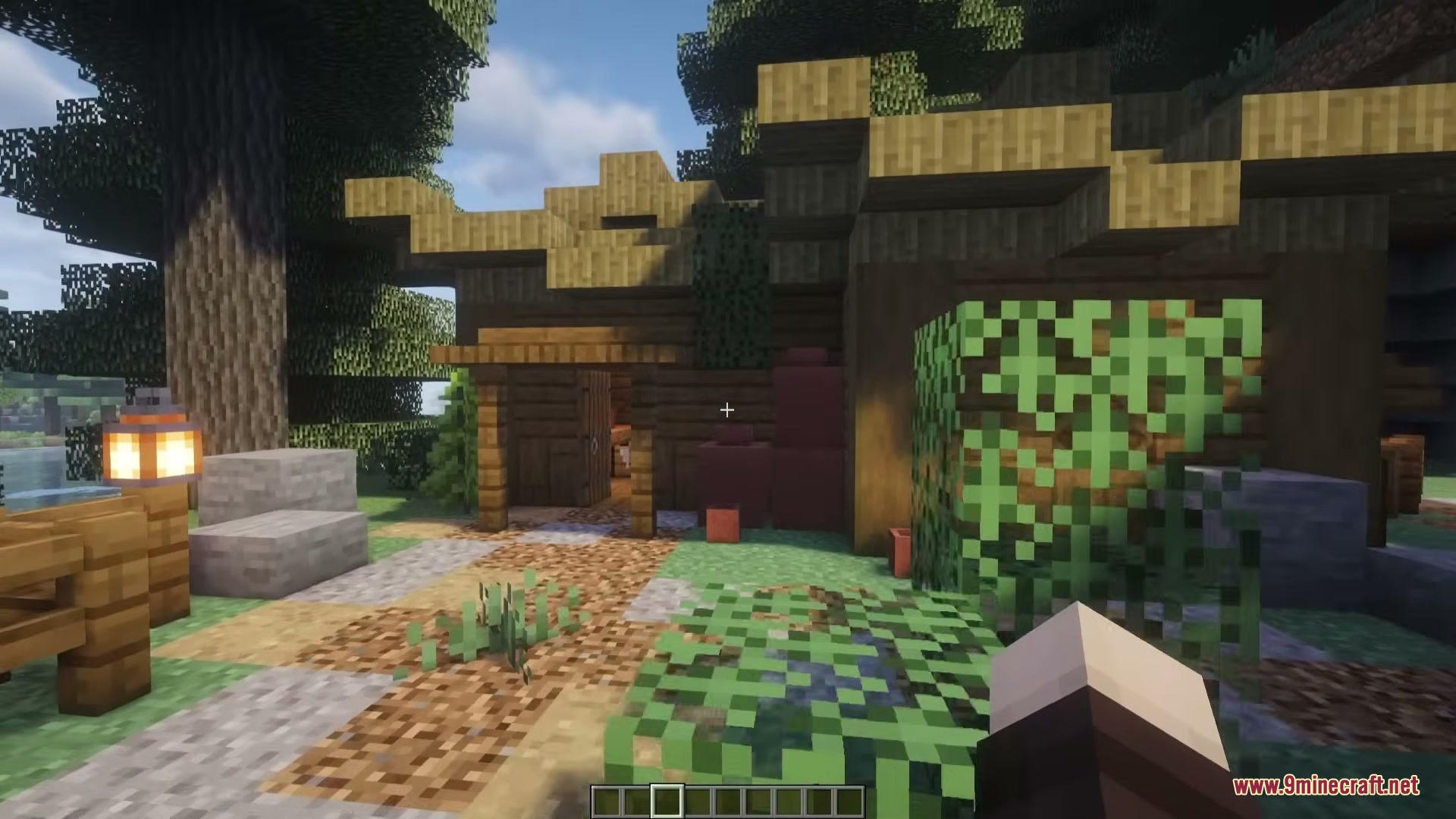 A small Japanese style house built with dark wood in the taiga
