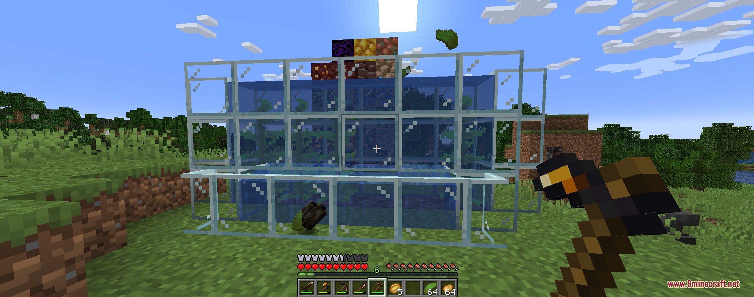 Anthracite Arsenal Mod Screenshot 8 Player using a coal hoe to harvest kelp into dried kelp