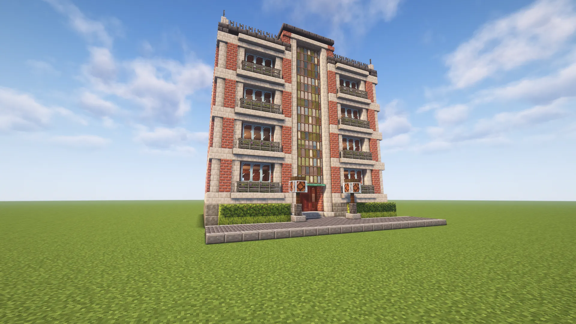 Apartment House Schematic Screenshots 1 Front view of a brick apartment building with balconies and stained glass