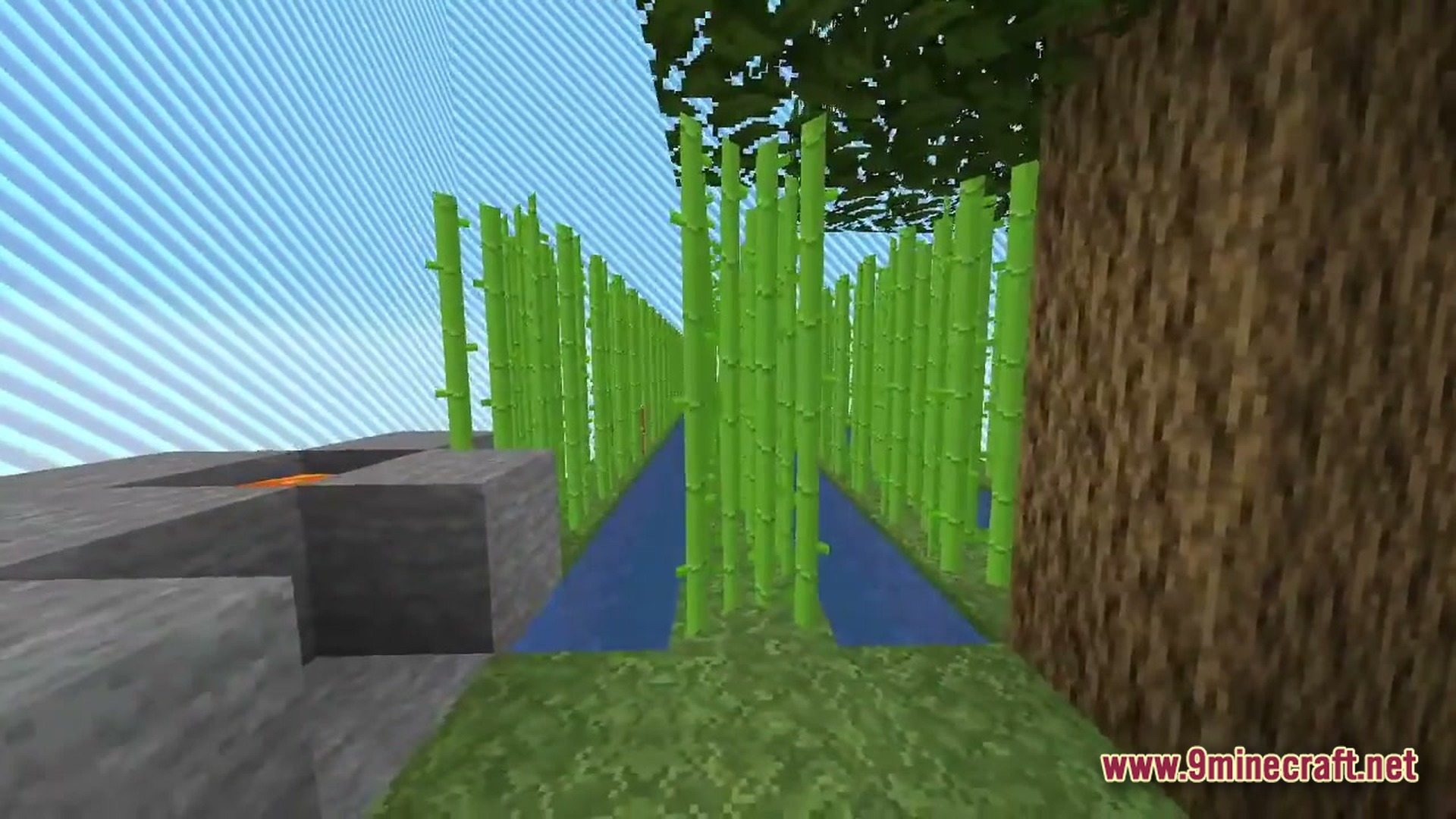 Arcane Industrial Synthesis Modpack Screenshot 2 Rows of sugar cane grow beside water channels near a stone structure and a tree