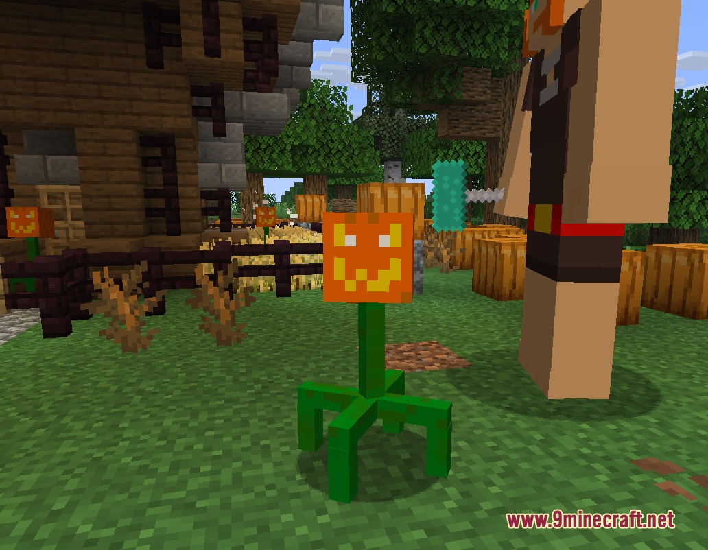 A small pumpkin creature stands on a green stem in a village