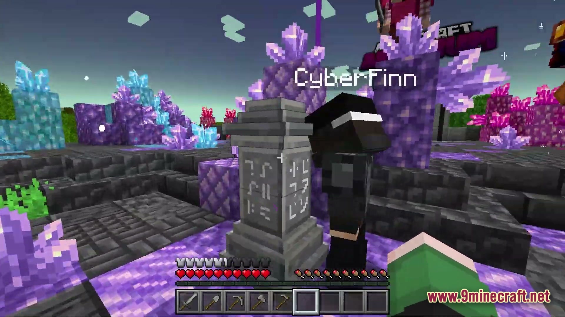 Arcanum Land Modpack Screenshot 1 A player stands next to an engraved stone pillar surrounded by large purple and blue crystals