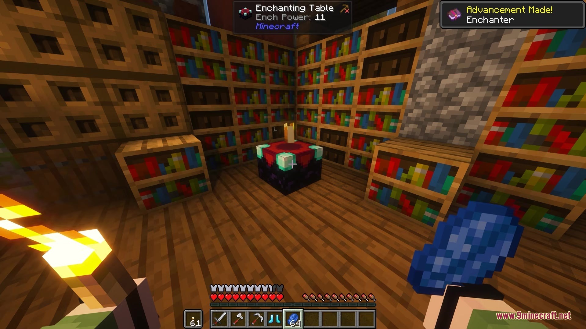 Armor Quick Swap Mod Screenshot 6 Player holding lapis lazuli near an enchanting table surrounded by wooden bookshelves