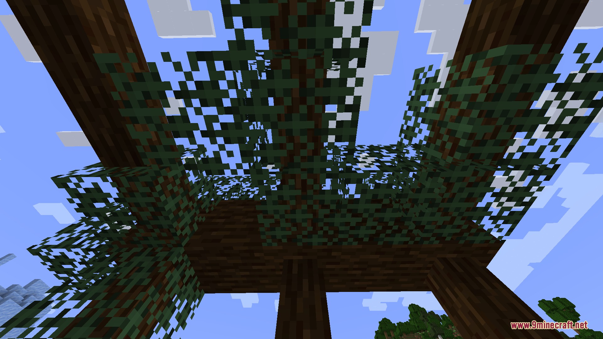 Artemis' Thin Logs Mod Screenshot 6 Looking up at thin logs with leaves and snow layers attached to them
