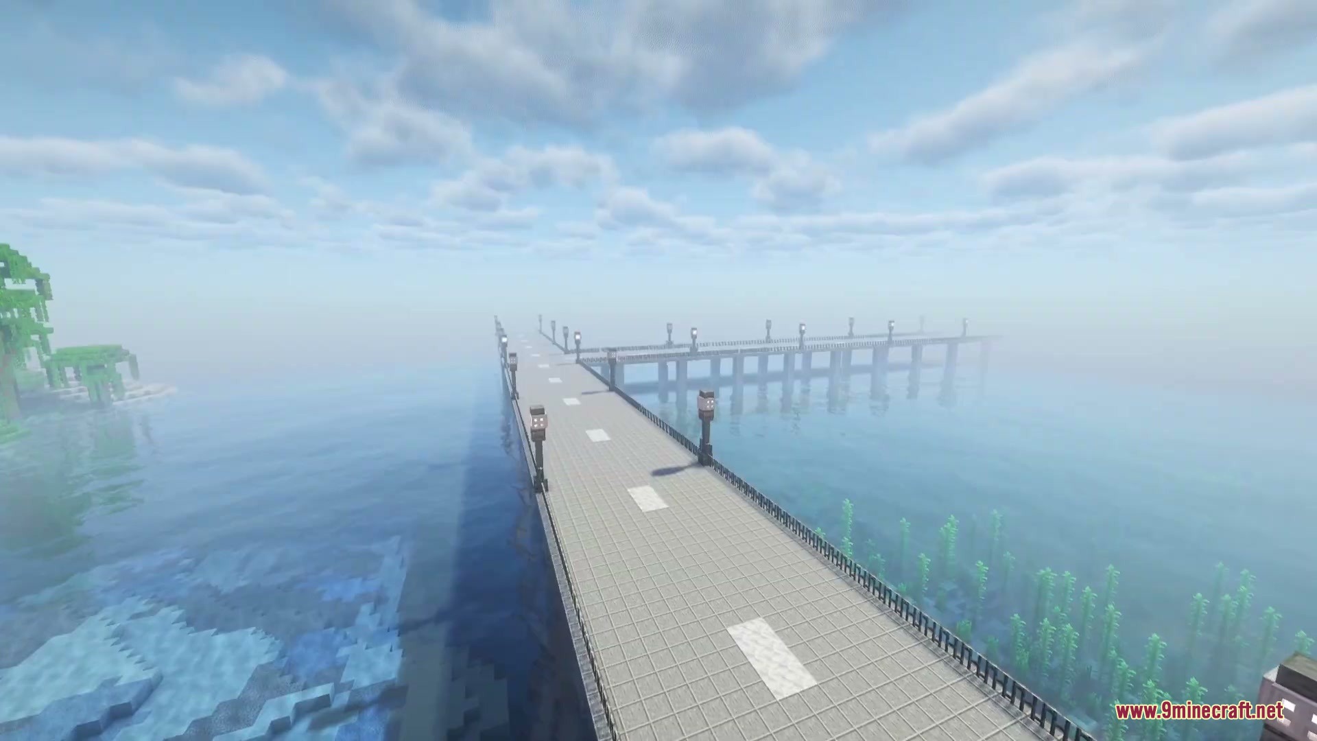 Asphalt Horizon Mod Screenshot 2 An asphalt bridge splitting into multiple directions over a large ocean biome