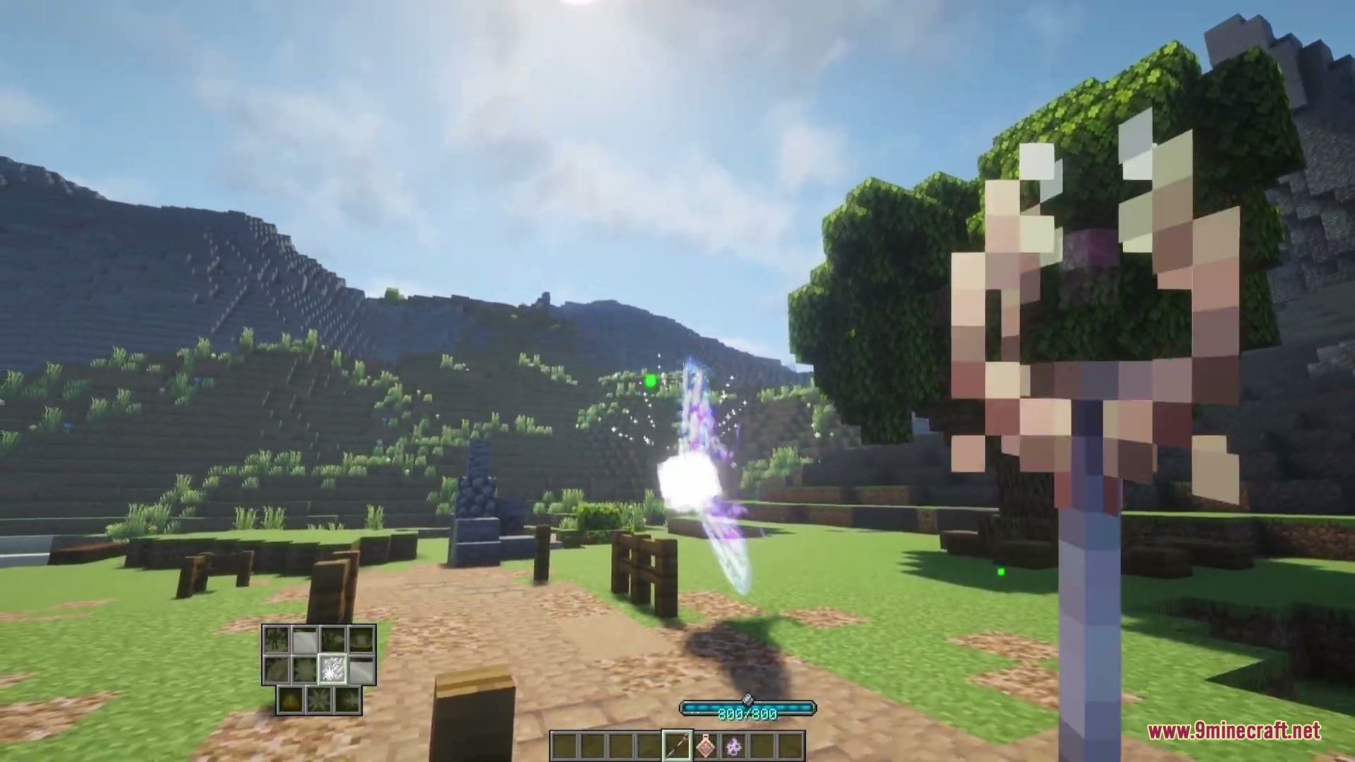 Player firing a glowing astral spell from an astrolabe in the mountains