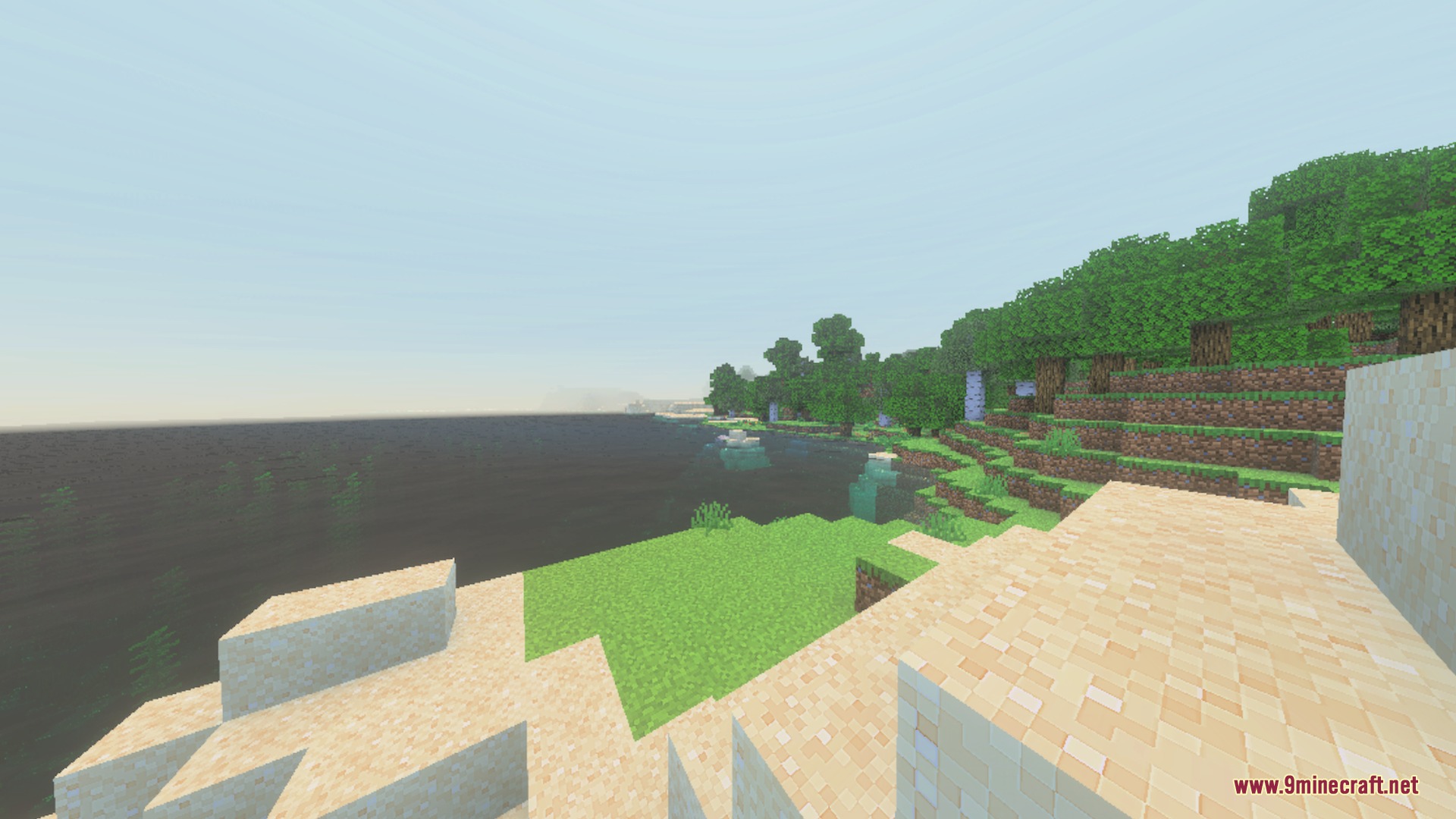 A scenic Minecraft coastline with bright cinematic lighting and crystal clear water