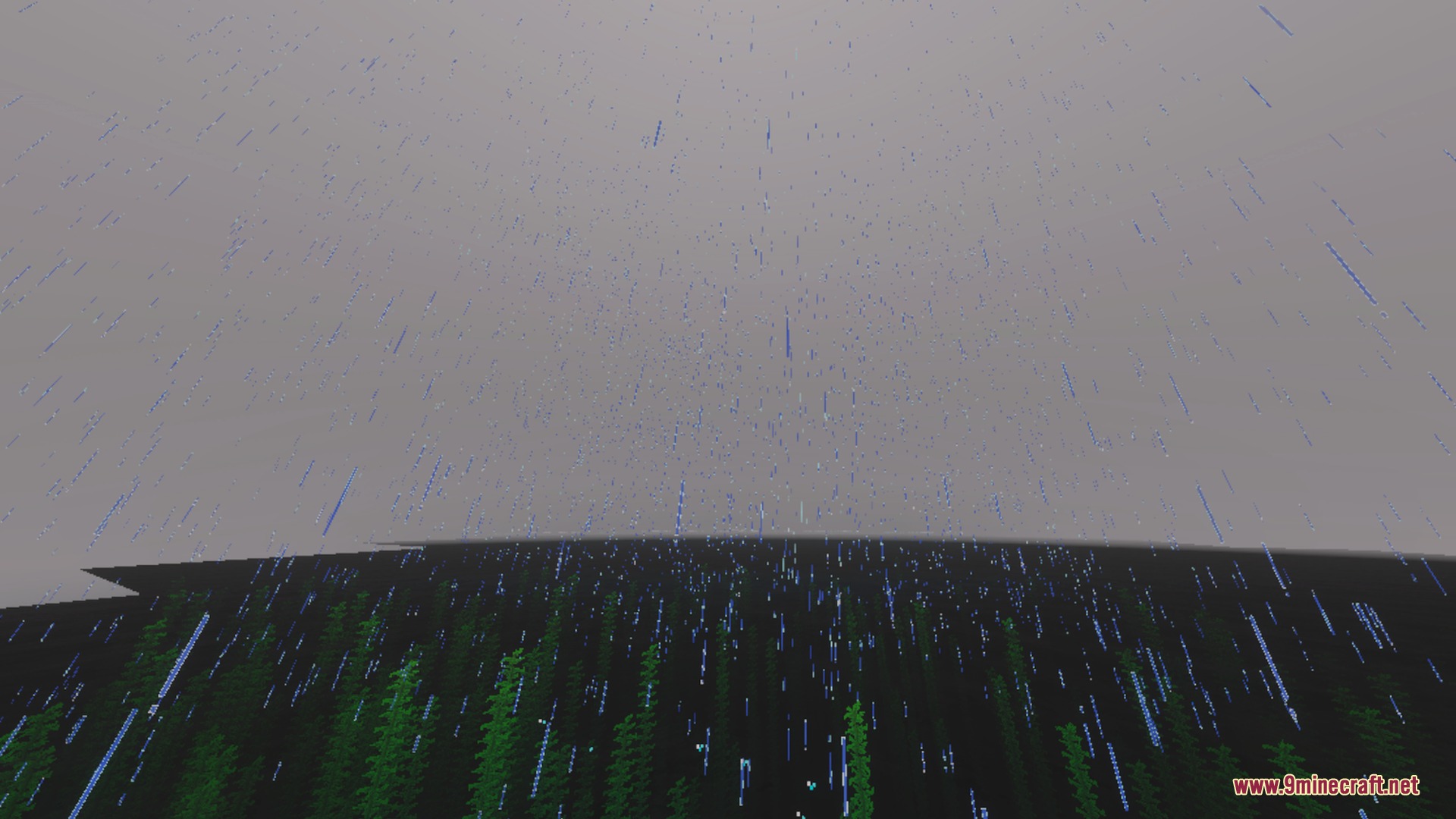 Rain falling over a dark forest landscape under a heavy grey sky