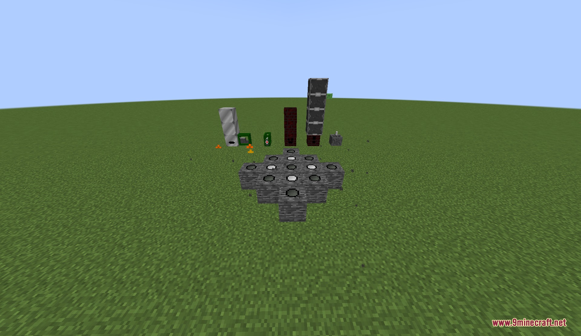 Industrial blocks and machines from Atomic Flux Industry Mod displayed in a field