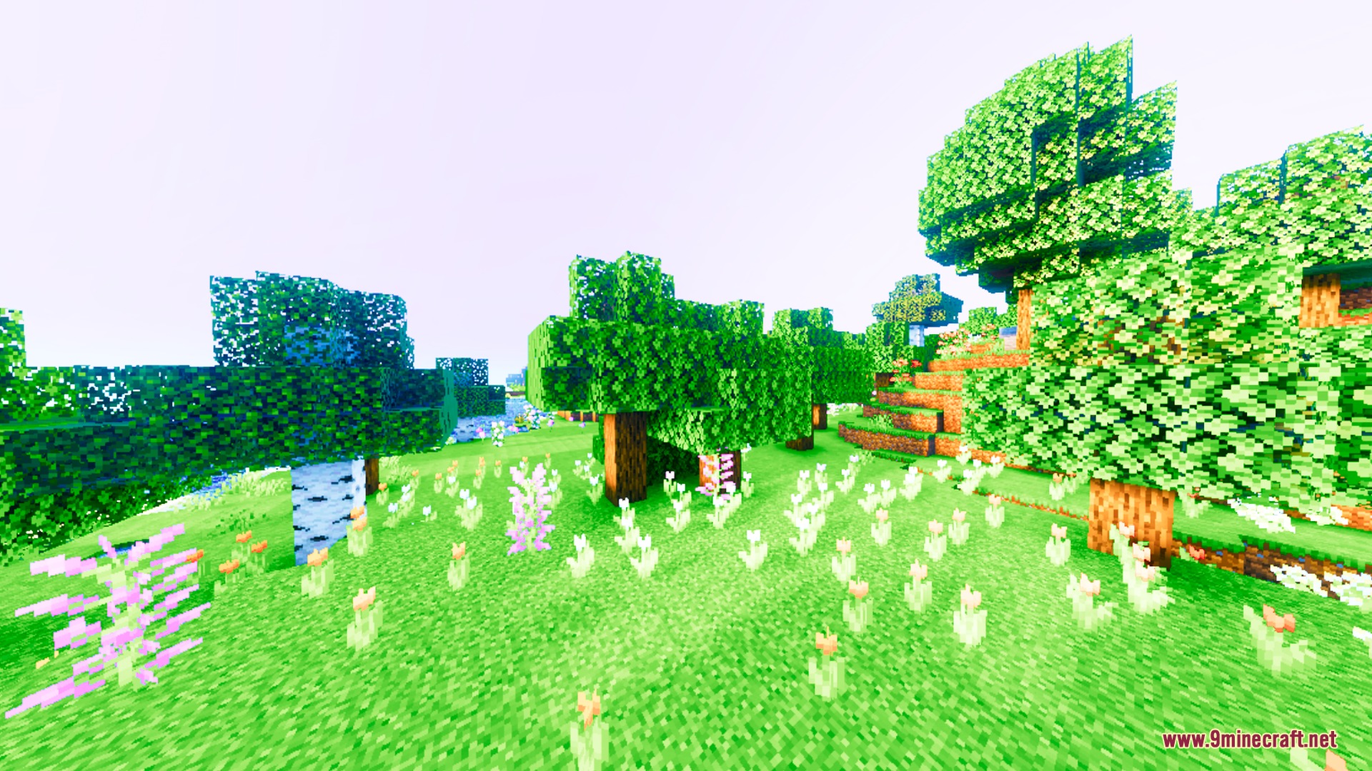 Auralis Shader Screenshot 10 Lush green forest filled with colorful flowers under a warm saturated sky
