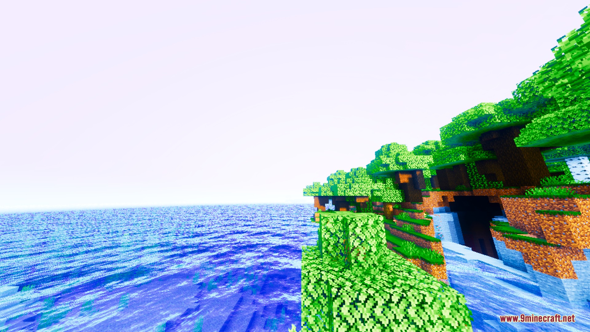 Auralis Shader Screenshot 2 Vibrant green trees grow on a cliff beside a glassy blue ocean surface