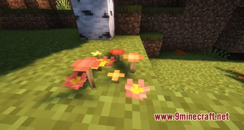 Autumn Fall Resource Pack Screenshot 2 Small orange mushrooms and pink flowers growing on a grassy block
